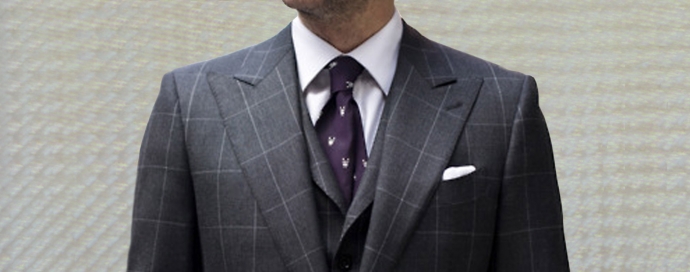 A Gentleman Wearing a Bespoke Made Shirt and Suit
